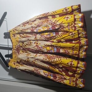 A GOOD SKIRT FOR WOMEN WITH MULTIPLE COLORS YELLOW, RED & BLUE.